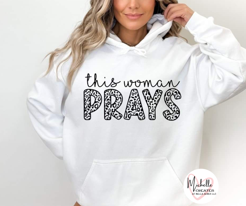This woman PRAYS Hoodie - Adult